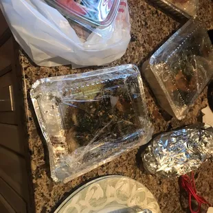 Unpacking the takeout order at home.