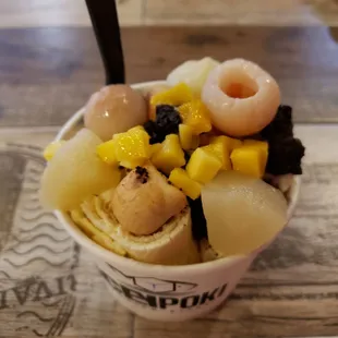 Double Lychee with toppings (lychee, pineapple, mango, panda cookies, Oreos) - $7.66