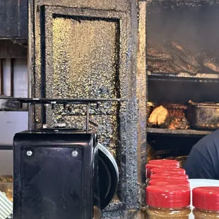 ows a man preparing food in a kitchen