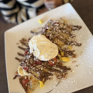 Crepe with pineapple, strawberries