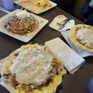 Meat Lovers griddle, banana foster pancakes, and philly style benny