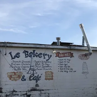 the side of a building with graffiti on it