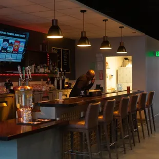 a man sitting at a bar