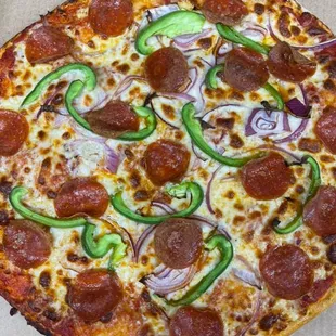 a pepperoni pizza in a box