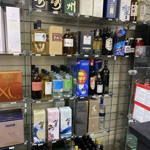 a shelf full of liquor