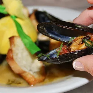 The shallots, garlic &amp; white wine made the perfect broth that filled the steamed mussels with flavor.