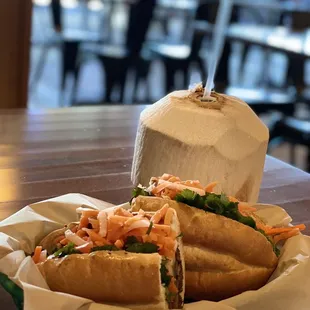 a sandwich and a drink on a table