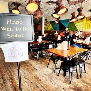 a restaurant with tables and chairs