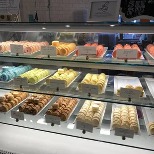 a display case of macarons
