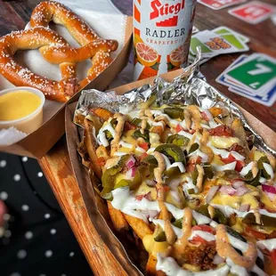 Loaded chili fries and a soft pretzel.