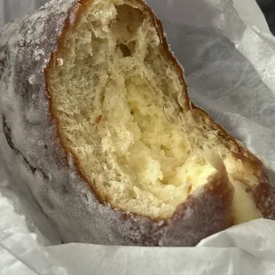 Custard doughnut with hair in dough