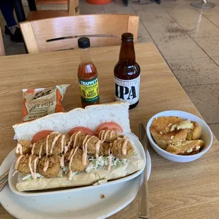 Shrimp po' boy, corn pudding. IPA beer