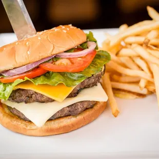 The Big Sexy - 2 Beef Patties, Sesame Seed Bun, Cheddar, Swiss, Bacon, L.T.O.P with French Fries