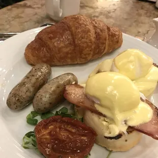 Hand made chocolate croissant and egg Benedict