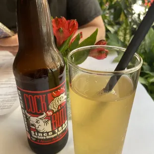 a glass of lemonade and a bottle of beer