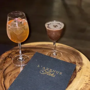 two glasses of wine and a book