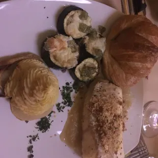 Whitefish, potatoes, and croissant