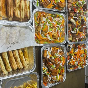 a variety of trays of food