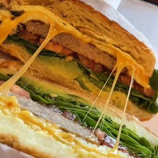 Sausage crossaint with spinach and tomatoes