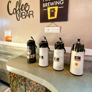 a counter with coffee and beer