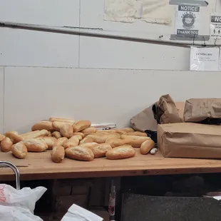 a bunch of bagels on a table