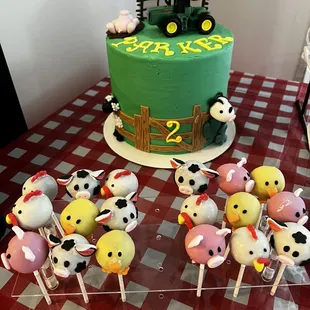 a farm themed cake with farm animals