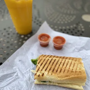 a sandwich and condiments