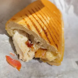 Hot chicken and bacon and tomato sandwich