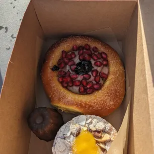 Top Seasonal Brioche Bun. Bottom Passionfruit Almond Tart &amp; Canale