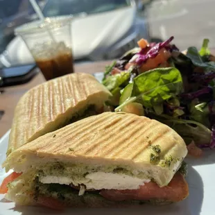 Mozzarella pesto panini with side salad