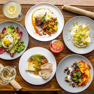 four plates of food on a table