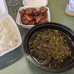 Sahka sahka: spinach cassava leaf seafood stew with lamb and rice. Side of plantains.