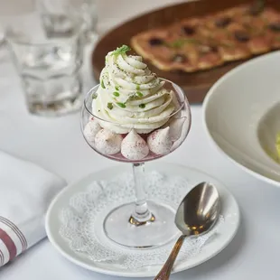 a dessert in a glass on a table