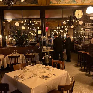 a dining room with tables and chairs