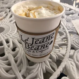 a cup of coffee on a table