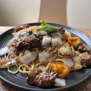 Garlic noodles with filet mignon
