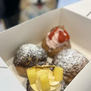 Mango Choux ($6), Strawberry Choux ($6), Original Choux w/ vanilla filling ($5), Chocolate Choux w/ chocolate filling ($5)