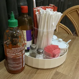 Condiments and utensils on the table