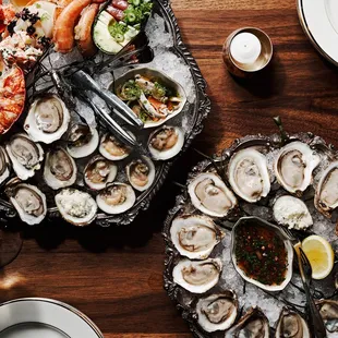 a platter of oysters and lobsters