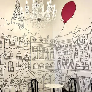 a drawing of a paris cafe