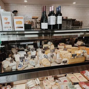 a display of cheese and wine