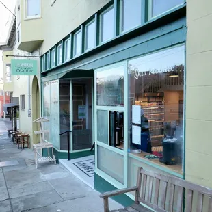 a bench on the sidewalk