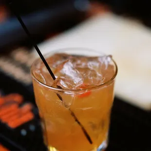 a drink in a glass with a straw