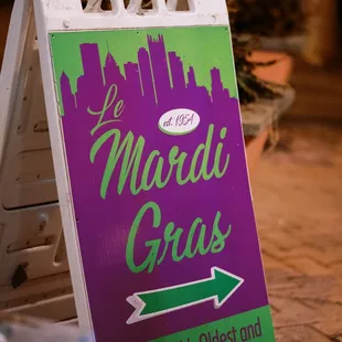 a sign on the sidewalk