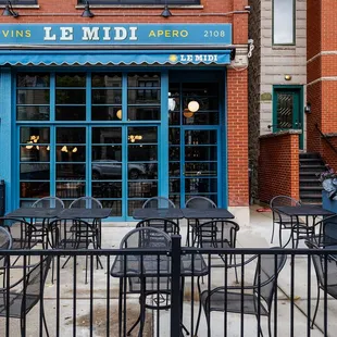 Le Midi storefront and patio on Division Street in Wicker Park, Chicago