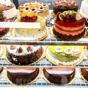 Cake display. I tasted a slice of pistachio and that's super good