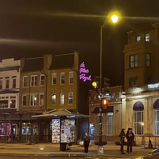 a street scene at night