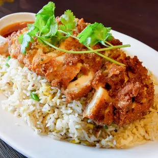 Fried chicken over fried rice. Very Yummy!!