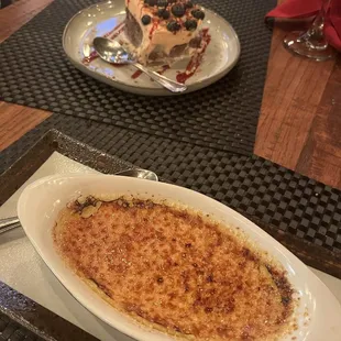 Creme brûlée and special dessert with a strawberry mousse on top