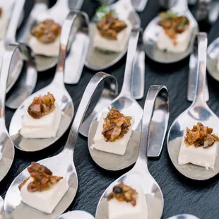 spoons of food on a table